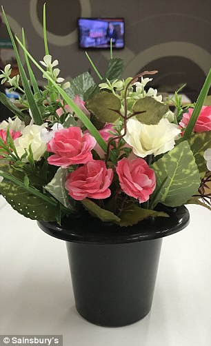 The couple went on a 'date' in the store's restaurant and Mr Holmes even dressed up for the occasion and brought her flowers.