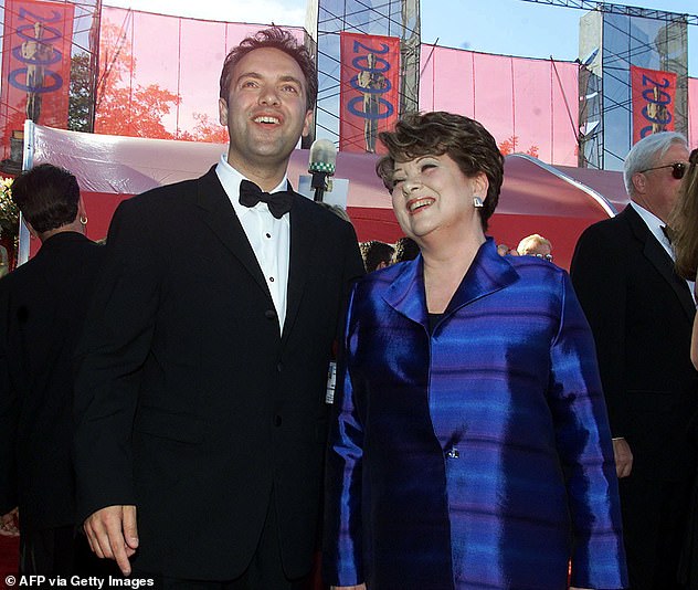 Mother and son: Sam's comments come after the director opened up about his childhood and being raised by a single mother in a new interview, following his parents' divorce (pictured with his mother Valerie in 2000)