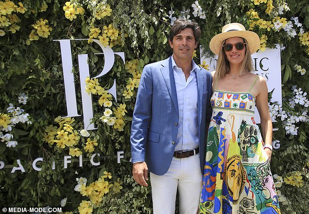 The couple looked stylish as they posed side by side, with Nacho wearing a blue blazer and dress shirt underneath.  Meanwhile, Delfina turned heads in a daring couture A-line gown.