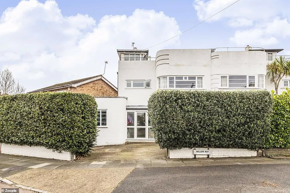 This striking Art Deco property in Twickenham has four bedrooms and the price tag has been slashed by more than a fifth