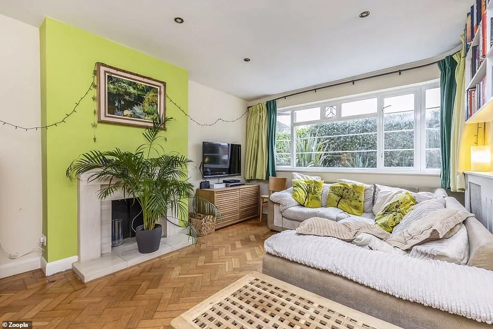 The unusual property has a large living room and is currently for sale for £725,000 through Snellers estate agents