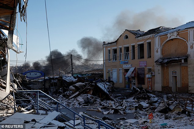 Plumes of smoke rise from a Russian attack during a 36-hour ceasefire for Orthodox Christmas declared by Russian President Vladimir Putin