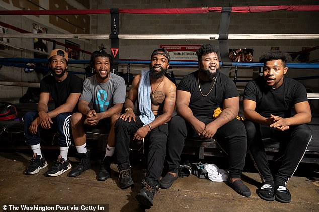 Gary Antonio Russell (left), Gary Antuanne Russell (second left) and Gary Russell Jr (centre) are the three boxing brothers Meek Mill was said to be in a ring feud with.