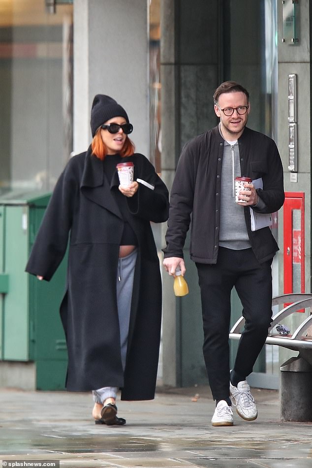 Casual: She opted for comfort by pairing the top with gray jogging pants and black loafers.