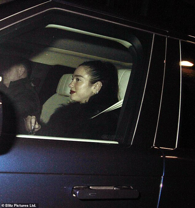 Low-key: The driver prepares to take the singer and her group of friends home after a fun night at the Chiltern Firehouse on Saturday night.