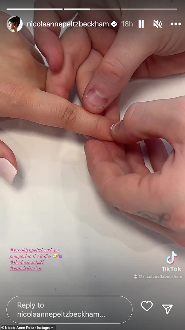 Taking great care: The model, 27, shared the moment chef Brooklyn, 23, decorated her hands on Sunday afternoon, captioning the post to her 2.7 million followers: 