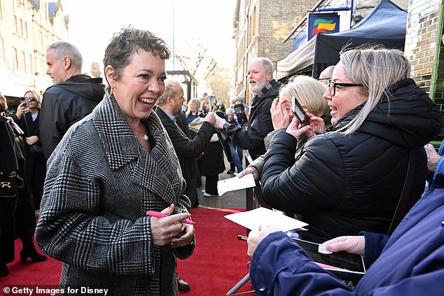 Adored: Arriving at the event in Kent to meet fans, she chose a checked wool coat to withstand the cold weather