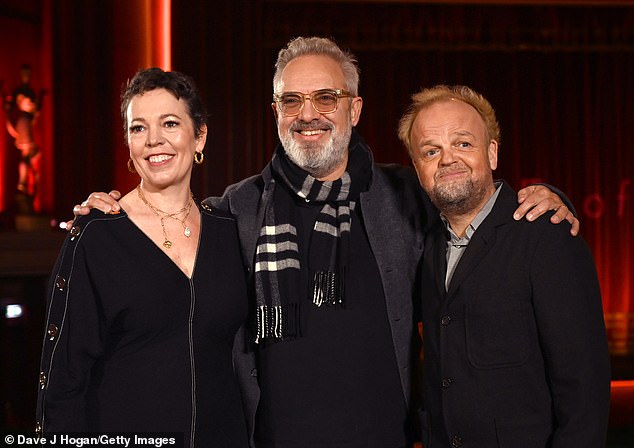 Threesome: Co-star Toby Jones joined the couple as the trio laughed and smiled at each other