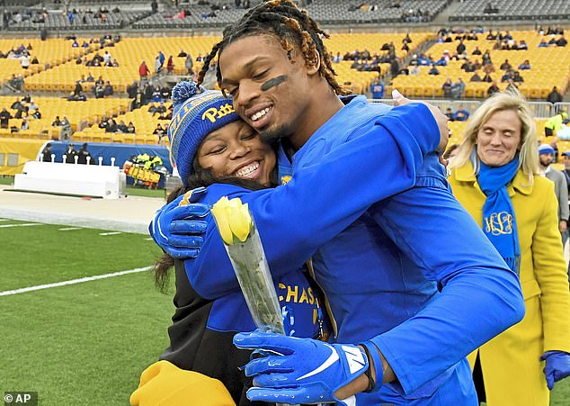 Hamlin is pictured with his mother, Nina, before a Pitts game against Boston College in 2019.