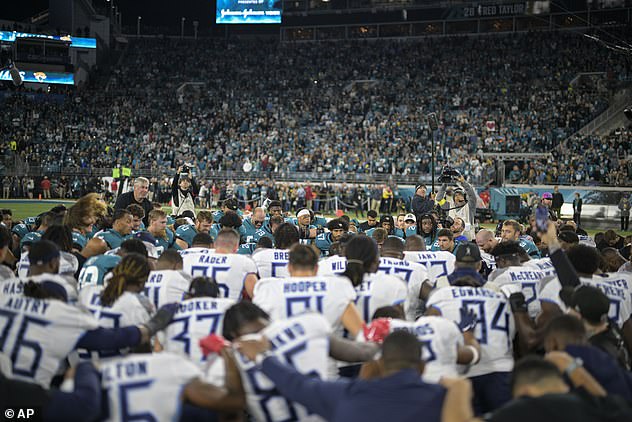 The Titans and Jaguars came together to pray for Hamlin before his game on Saturday.