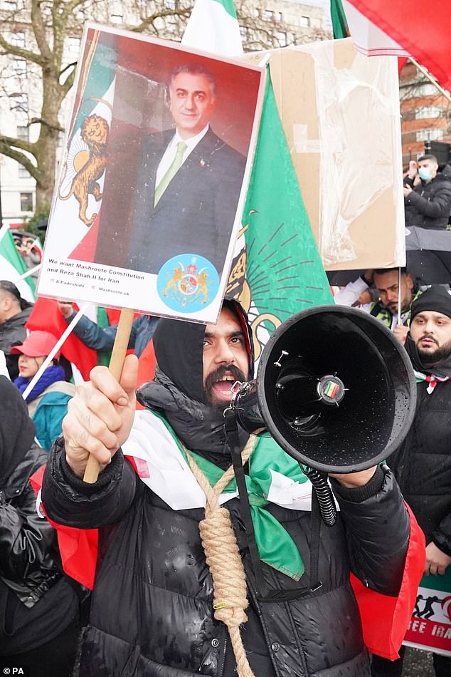 Protester calling for Reza Shah II for Iran, referring to the secular Pahlavi dynasty (1925-79)