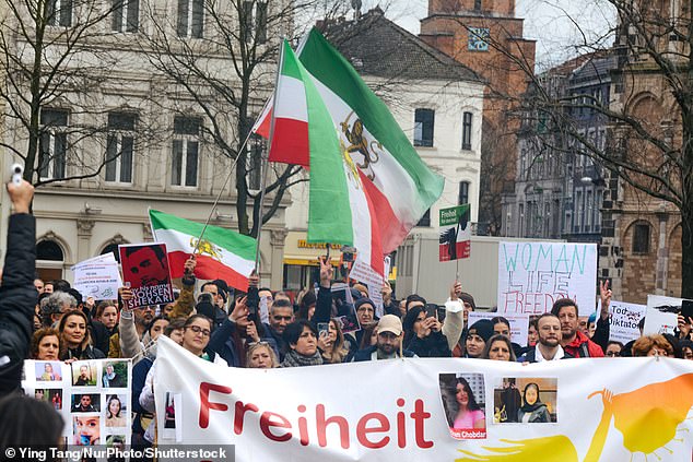 Protesters gathered at the Muenster square in Bonn, Germany, yesterday afternoon.