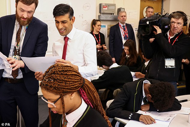 Prime Minister Rishi Sunak declared this week his new plan for all students in England to study some form of mathematics until the age of 18.  He is shown during a visit to Harris Academy in Battersea, South West London, today.