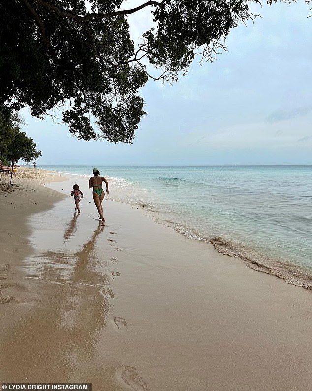 Like Mother Like Daughter: Lydia and her daughter Loretta, whom she shares with her ex-boyfriend, can be seen running along the beach together.