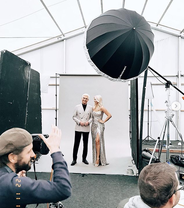 Dream team: Holly beamed alongside her co-host Phillip Schofield as they posed for promotional photos in their stunning outfit.