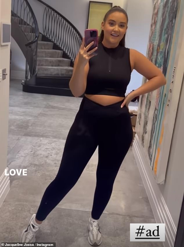 Work it out: She posed in the high-waisted leggings while capturing her best angles in the mirror video