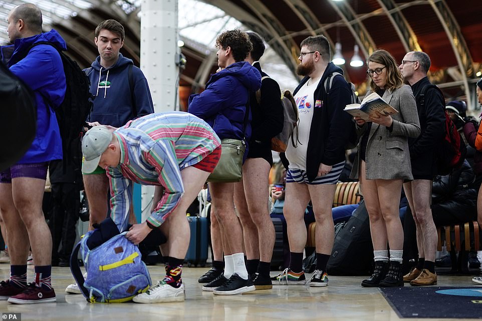 I still have to queue though - commuters wait for a train to stop at the platform in Paddington