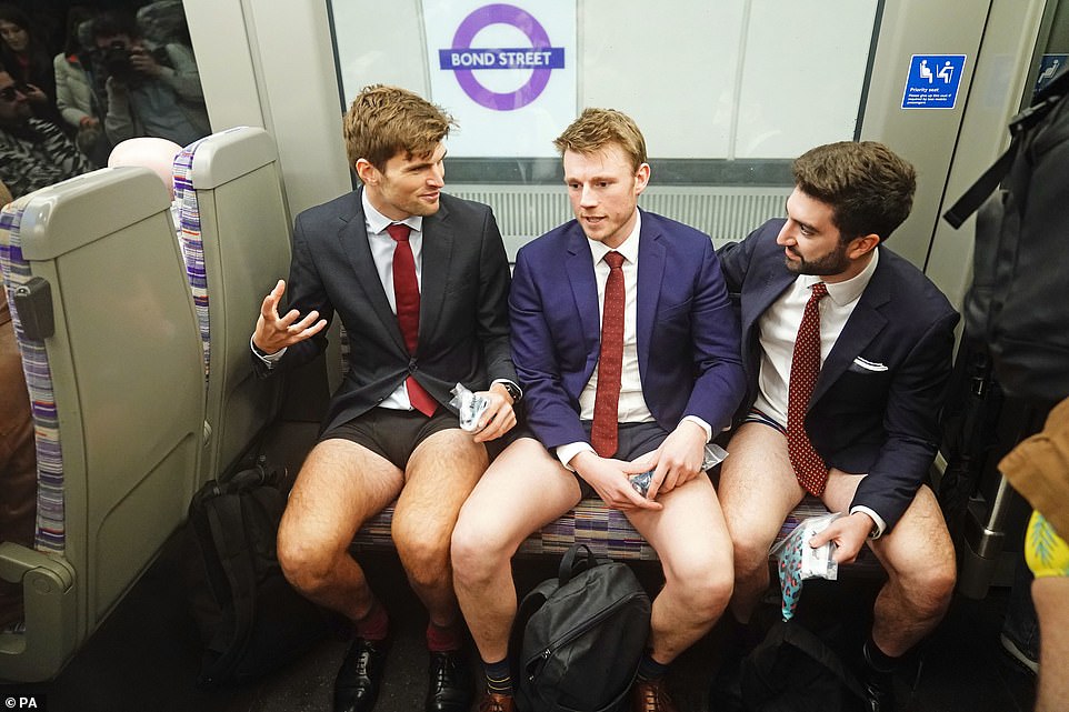 Office clothes and just underwear: three smartly dressed guys join in on the fun