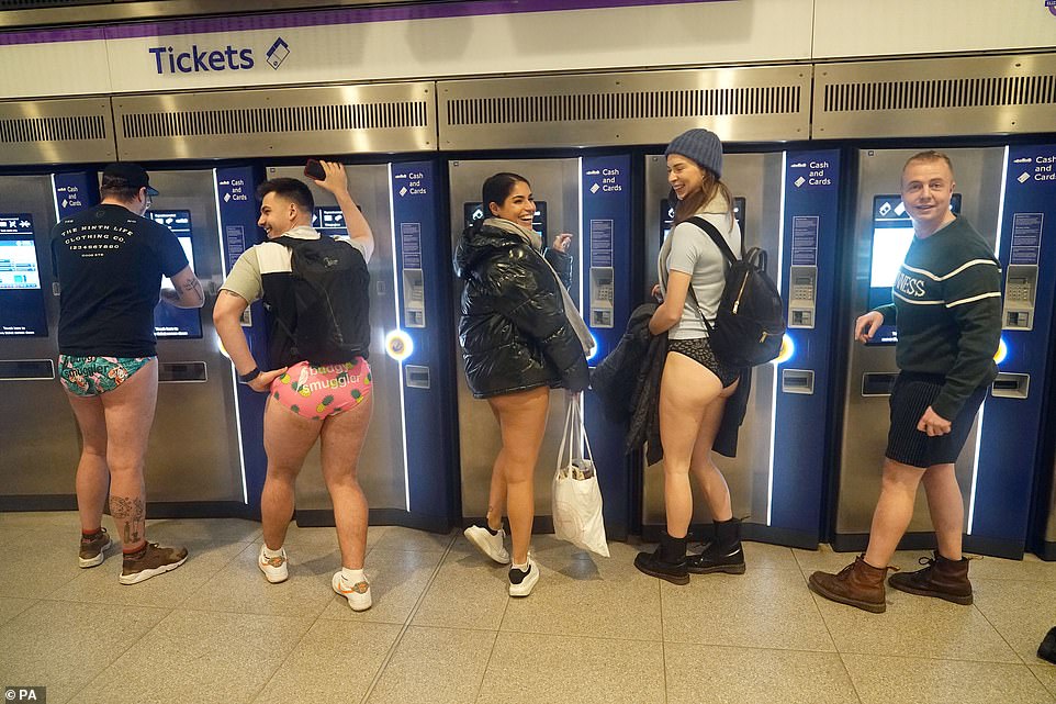 Tickets please: Travelers in their underwear buy tickets for their trips