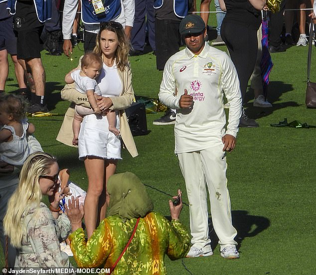 WAG Rachel Khawaja (left) was also seen celebrating with her cricketer husband Usman Khawaja (right) and daughters Aisha and Ayla.