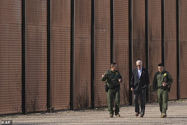 The president spoke with Border Patrol agents as he walked along the border fence.