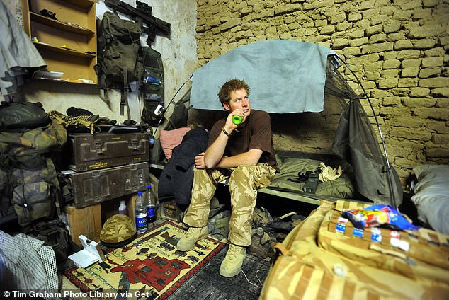 He said he began 'living his life on adrenaline' from the moment she died, spending years 'fighting himself' and the 'British press'.  He is seen in Afghanistan in 2008.