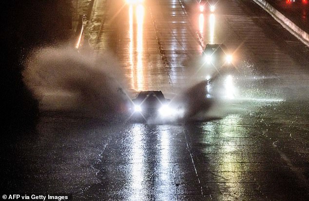 On Wednesday, cars plowed into huge puddles of water from ongoing severe California storms.