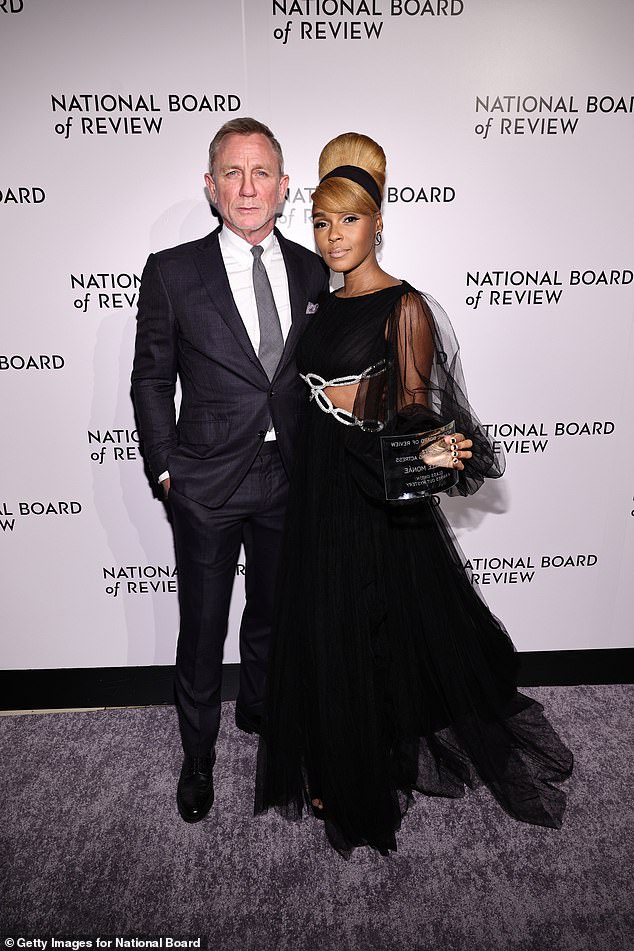 Hilarious: Janelle, who cut a graceful figure in a see-through black dress, quipped: 'Are you kidding me?  Do they have (expletive) James Bond?