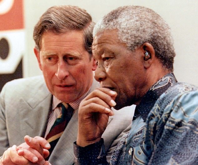 When the Prince of Wales takes Harry to South Africa for term, on a trip that includes Nelson Mandela and a Spice Girls concert, Harry says it's all about generating positive PR for Prince Charles.  What rot.  Closing: Charles and Nelson Mandela in London in 1996