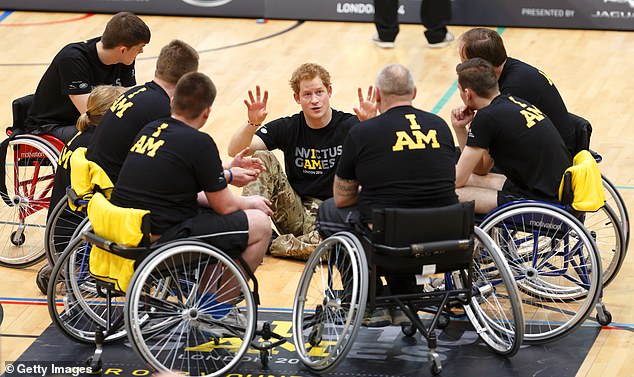 The 2023 Invictus Games will take place in Düsseldorf, Germany in September.  Prince Harry is photographed with a wheelchair basketball team