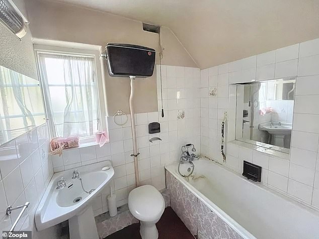 The property is extremely dated but functioning, with this family bathroom in working condition