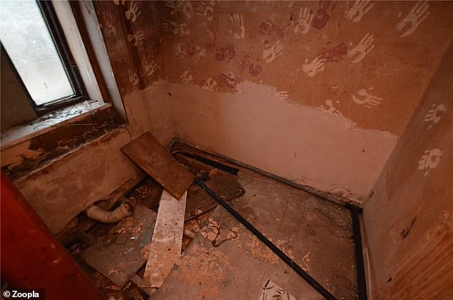 The floors of this room in the property are in need of repair as they are currently not safe to walk on