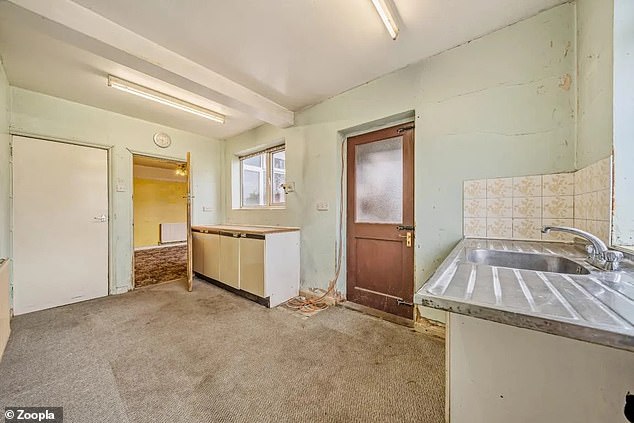 The property is in need of renovation which would involve taking this kitchen out and rebuilding it from scratch