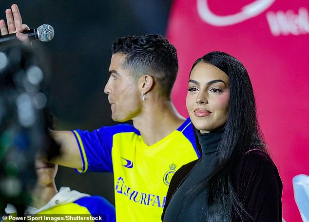 Rodriguez looks on as Ronaldo waves to a stadium full of cheering fans at his unveiling in Riyadh