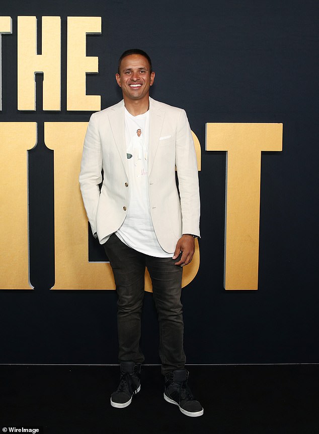 Usman Khawaja kept his look fresh in a white T-shirt and cream blazer.  In the photo