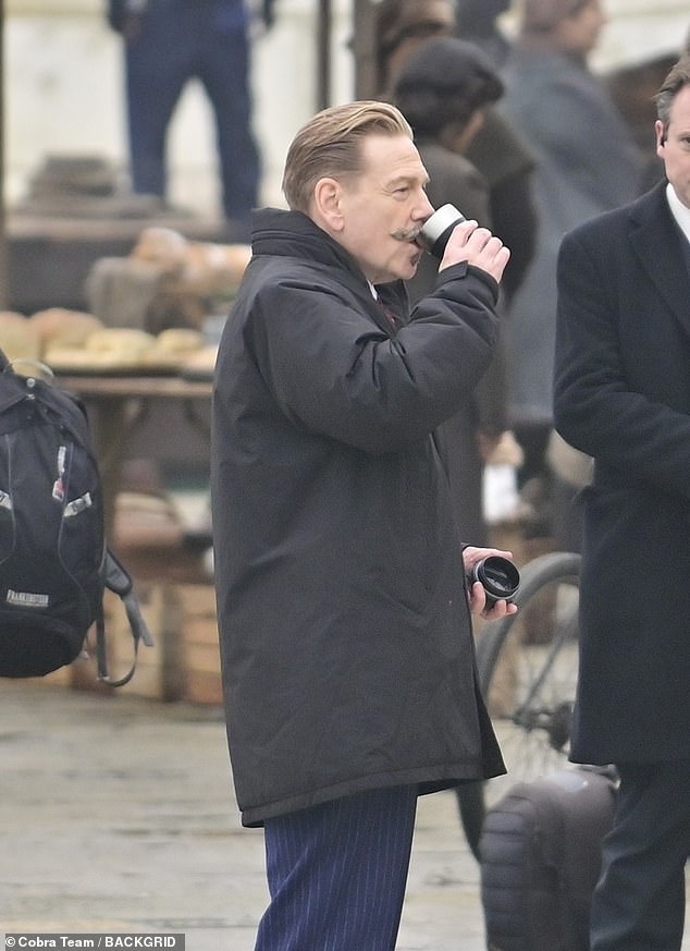 Some Coffee: He enjoyed a hot drink while taking a break from acting scenes.