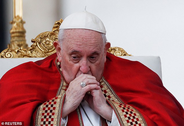 Pope Francis, who succeeded Benedict in 2013, sat in a chair near the altar in front of the crowd of tens of thousands of mourners for the late Pope's funeral