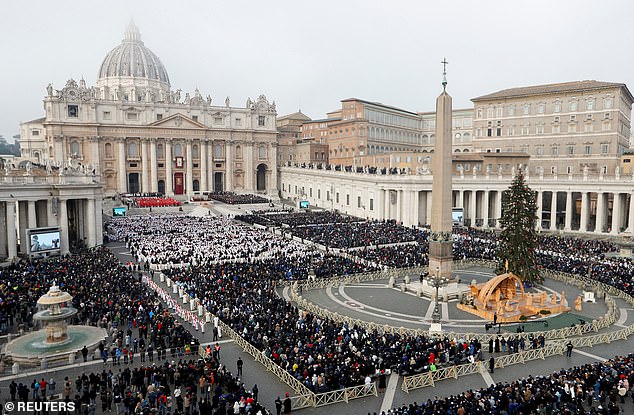 Mourners gathered in St Peter's Square for Pope Benedict XVI's two-hour long ceremony