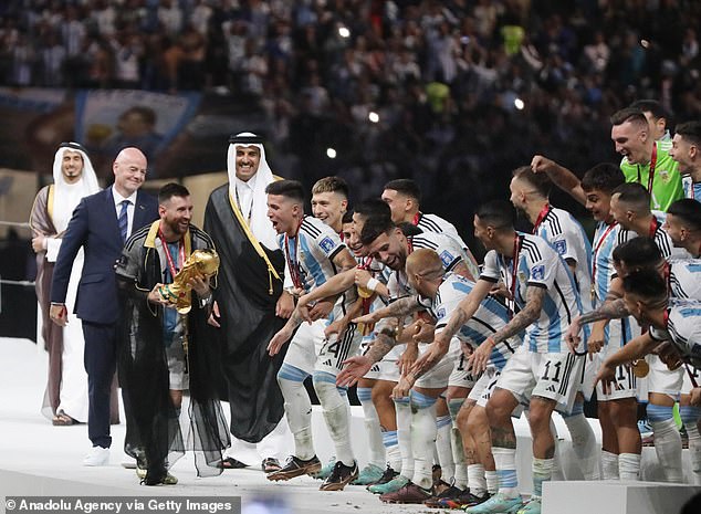 Argentina's Lionel Messi, Qatar's Emir Sheikh Tamim bin Hamad Al Thani and FIFA President Gianni Infantino are seen at the trophy presentation after the World Cup final match between Argentina and France at Lusail Stadium on Dec. 18 -- No. 38 on the list