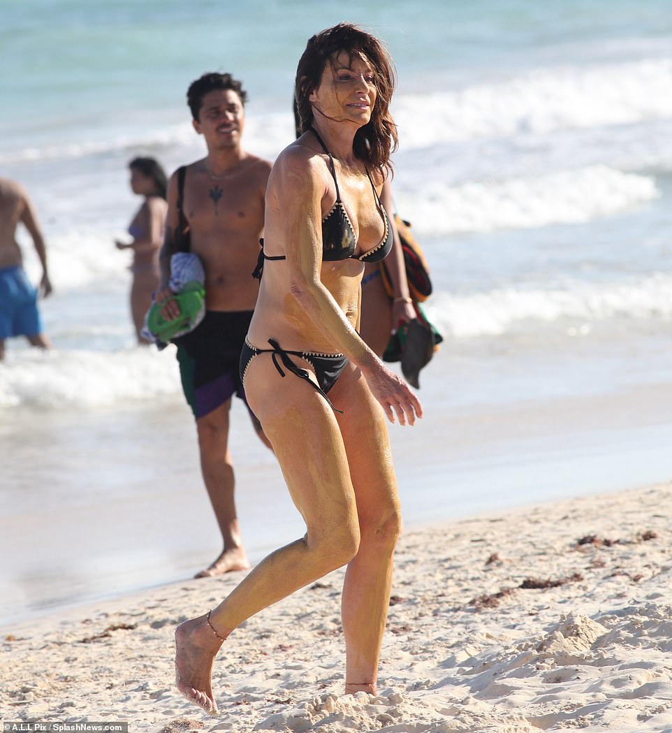 Fancy Coastal Stuff: She looked to be in the best shape of her life as she rocked the two-piece with her hair down while enjoying the warm weather south of the border