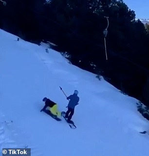 1673283219 579 Snowboarder loses grip of tow lift and wipes out skiers