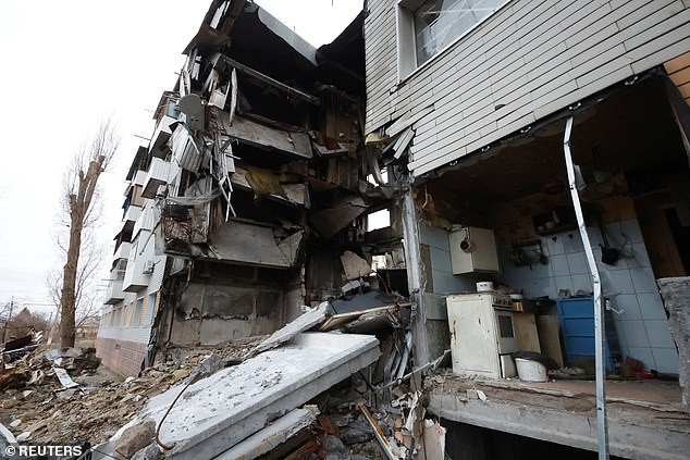 An apartment block destroyed by a missile strike is seen, as Russia's attack on Ukraine continues, from the frontline Donbas city of Bakhmut on January 5, 2023