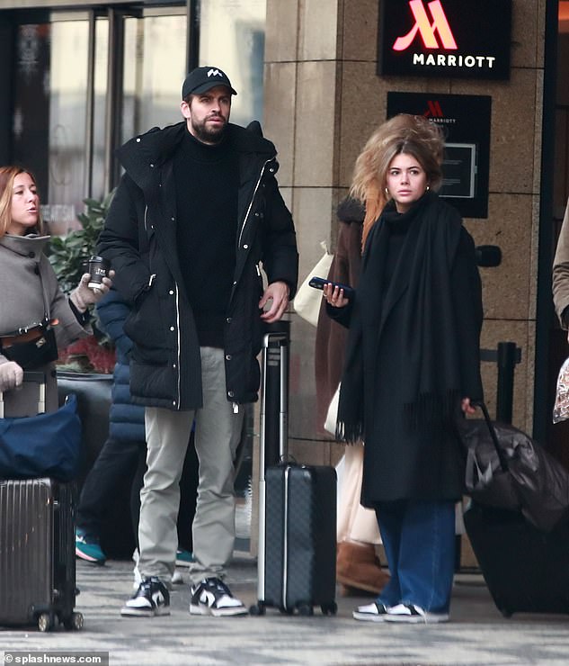 Weekend out: Gerard was photographed flirting with his new girlfriend Clara Chia after enjoying a weekend together in Prague last month.