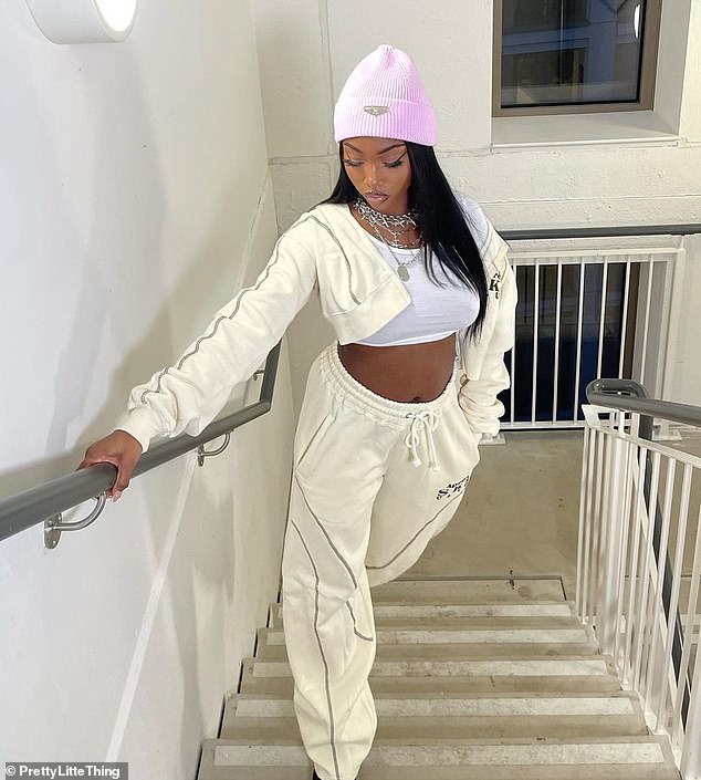 Outfit: The former Love Island finalist cut a stylish figure in a cream set of cuffed joggers and a cropped zip-up sweatshirt