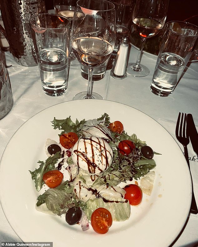 Hmm!  She also shared a photo of her dinner, a burrata salad.