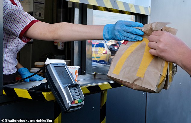 Australian motorists could be fined up to $534 and could lose a whopping five demerit points if they use their phone to pay at a drive-thru