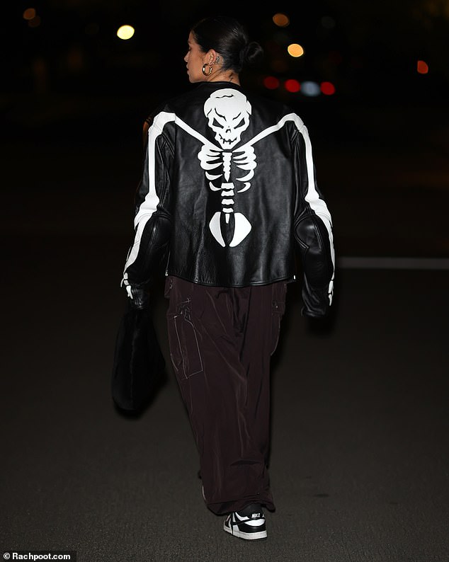 Skeleton: Nicole prepared herself for the frigid temperatures of Southern California in a black leather racing jacket with a skeleton on the back.