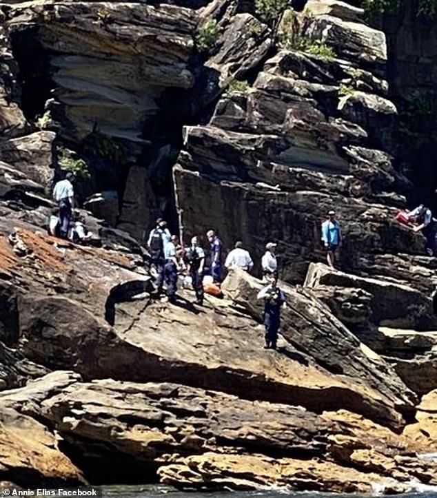 The 47-year-old woman was face down in the water when the girls found her in Gordons Bay, next to Clovelly Beach in eastern Sydney.