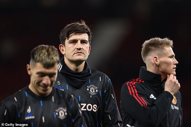 United captain Maguire (centre) has fallen down the club's pecking order