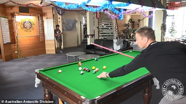 The staff work hard on the bases, but there is plenty of free time to relax and shoot pool.